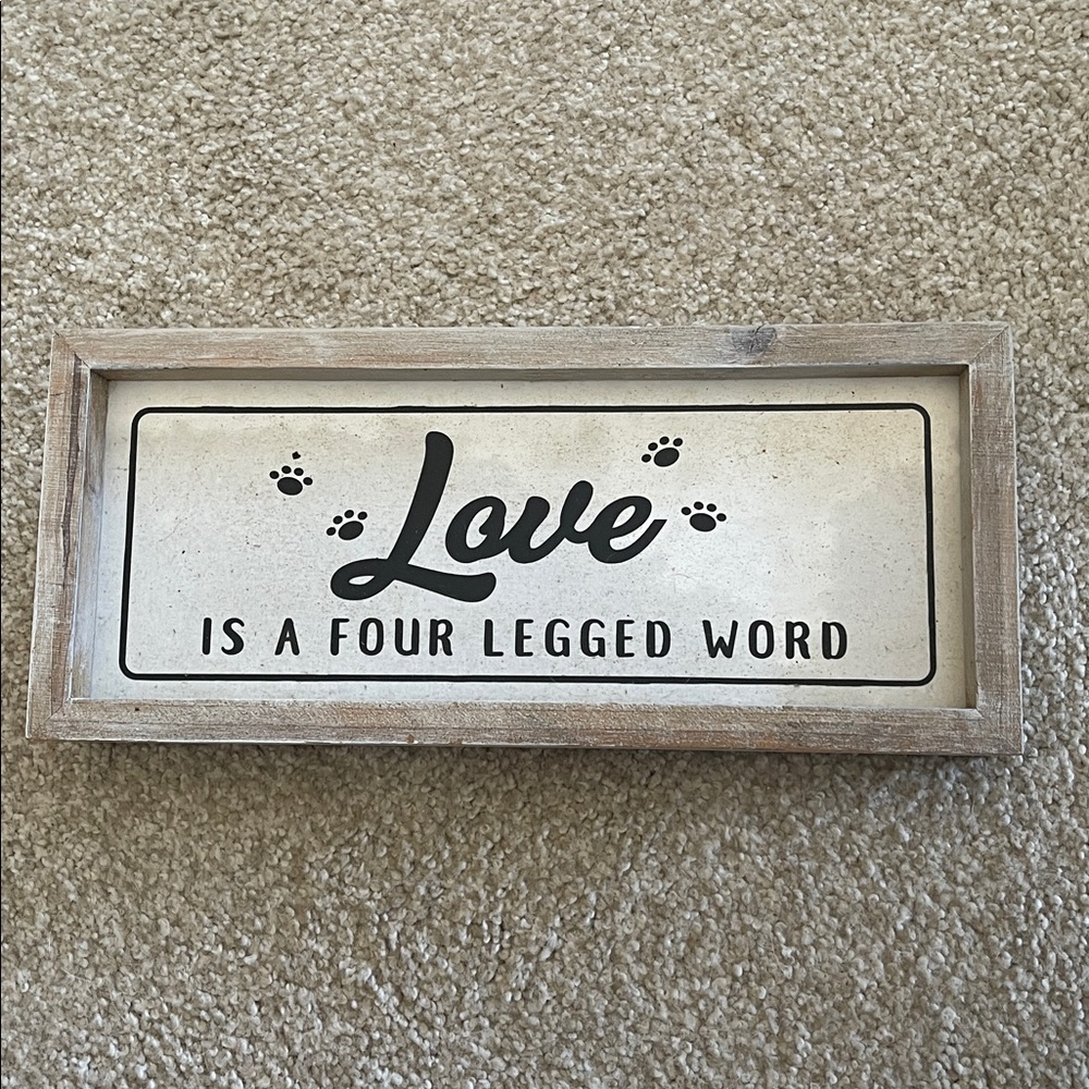 Wooden Sign with 'Love is a Four Legged Word' Quote
